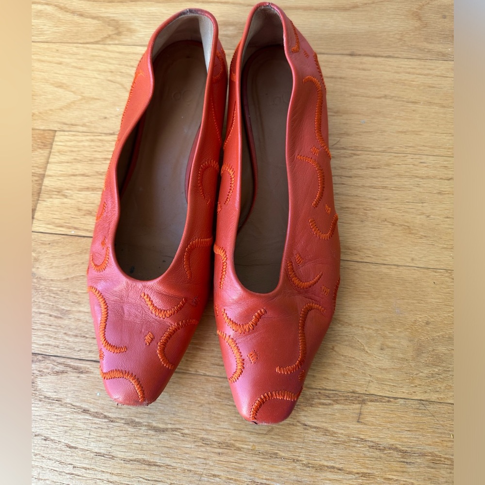 Orange leather flats (small heel).
